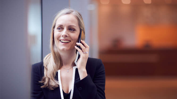 Experian Investor team employee on the phone in the office 